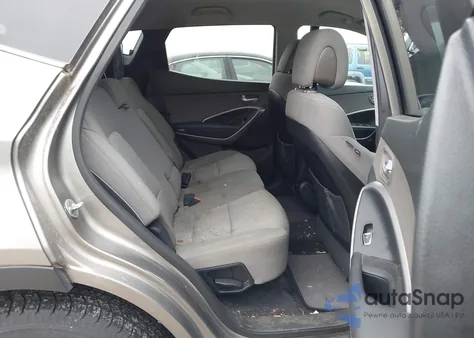 2015 Hyundai Santa Fe Sport 2.4L z USA, uszkodzony, nr VIN 5XYZTDLBXFG290432